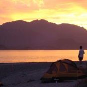 IH tent person sunset Carmen 9x6