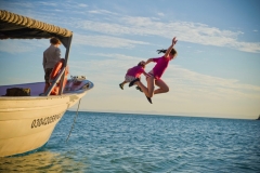 IH kids jumping off boat 9x6